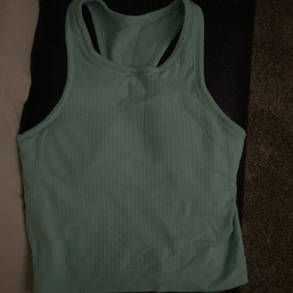 A lululemon tank top with a built in bra and ribbed design.